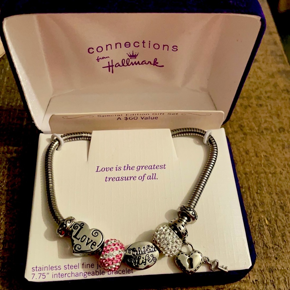 Stainless Steel Bracelet with 7 charms